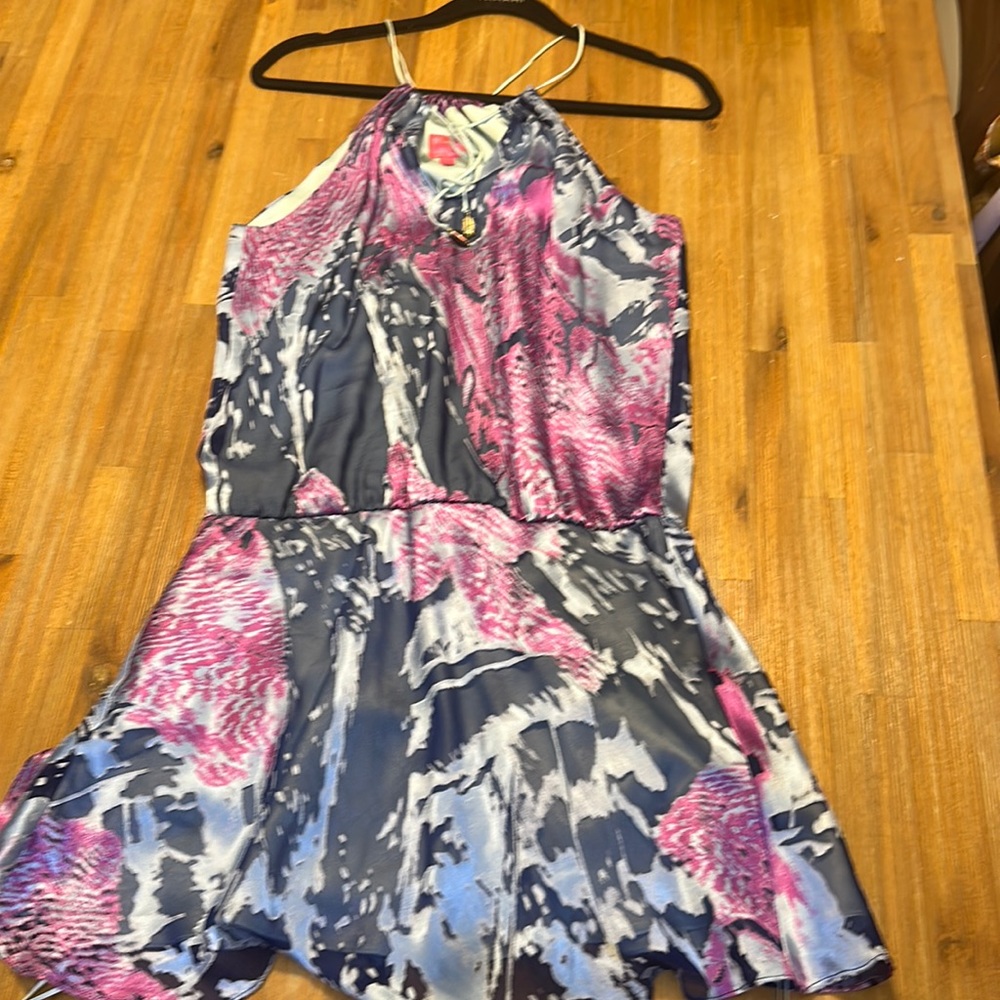 Beautiful pattern mini dress in blue/purple colors in a silk material.  size 2
